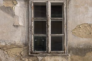 Windows 3.0 / Tiled wooden window on an old building