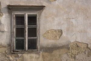 Windows 3.0 / Tiled wooden window on an old building
