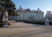 Slavkov Castle view from its park with trees